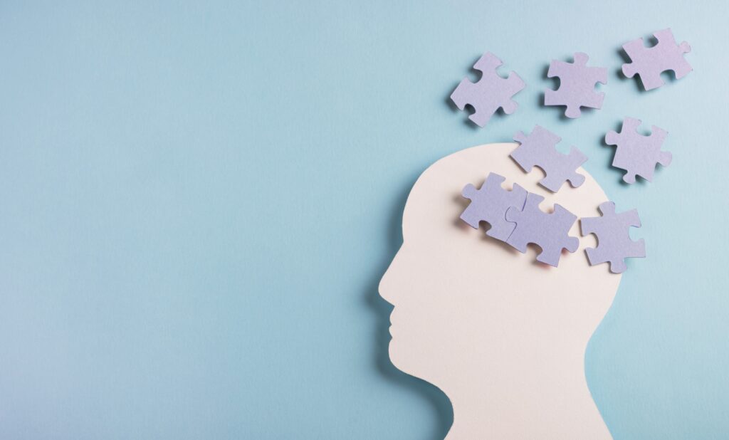 someone thinking and having thoughts as puzzle pieces 