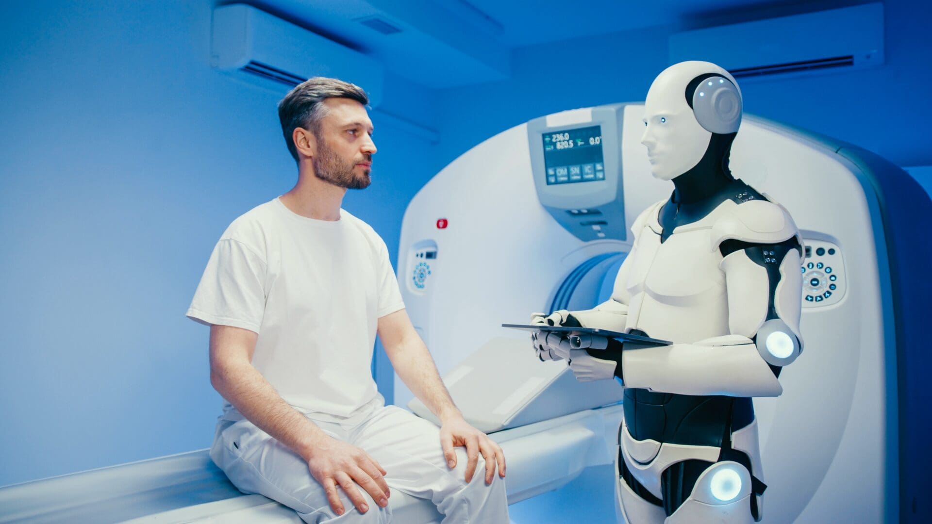 A robot doctor reviews a patients results