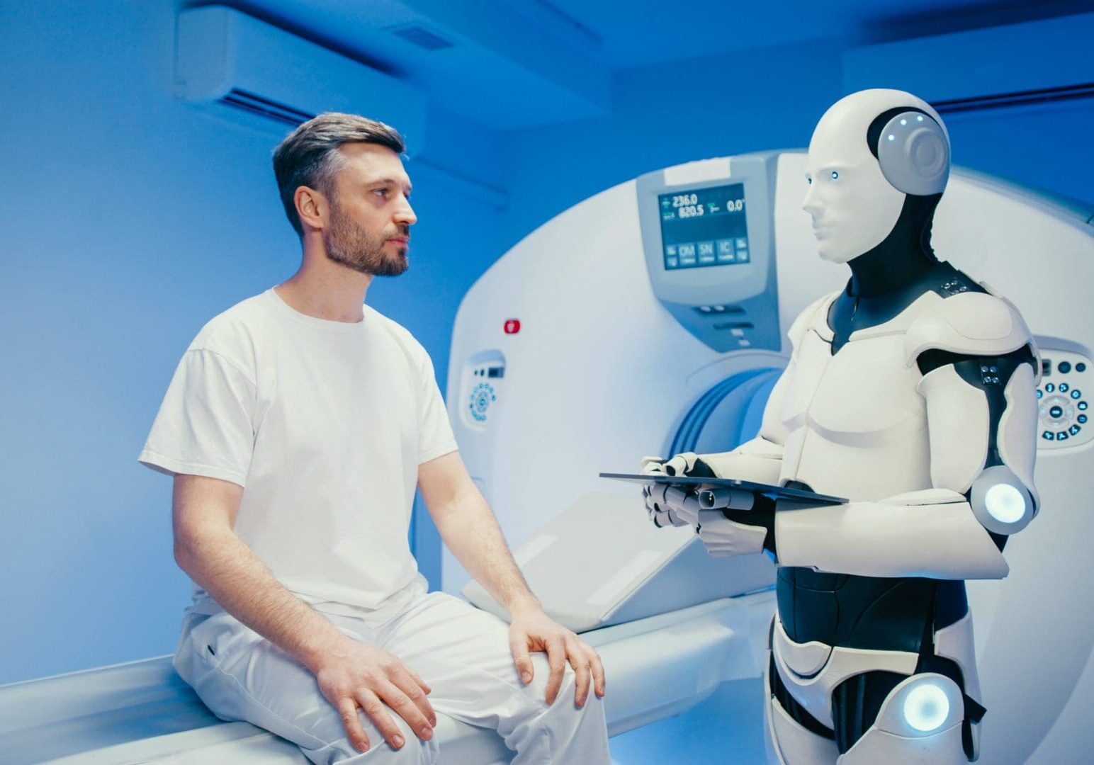A robot doctor reviews a patients results
